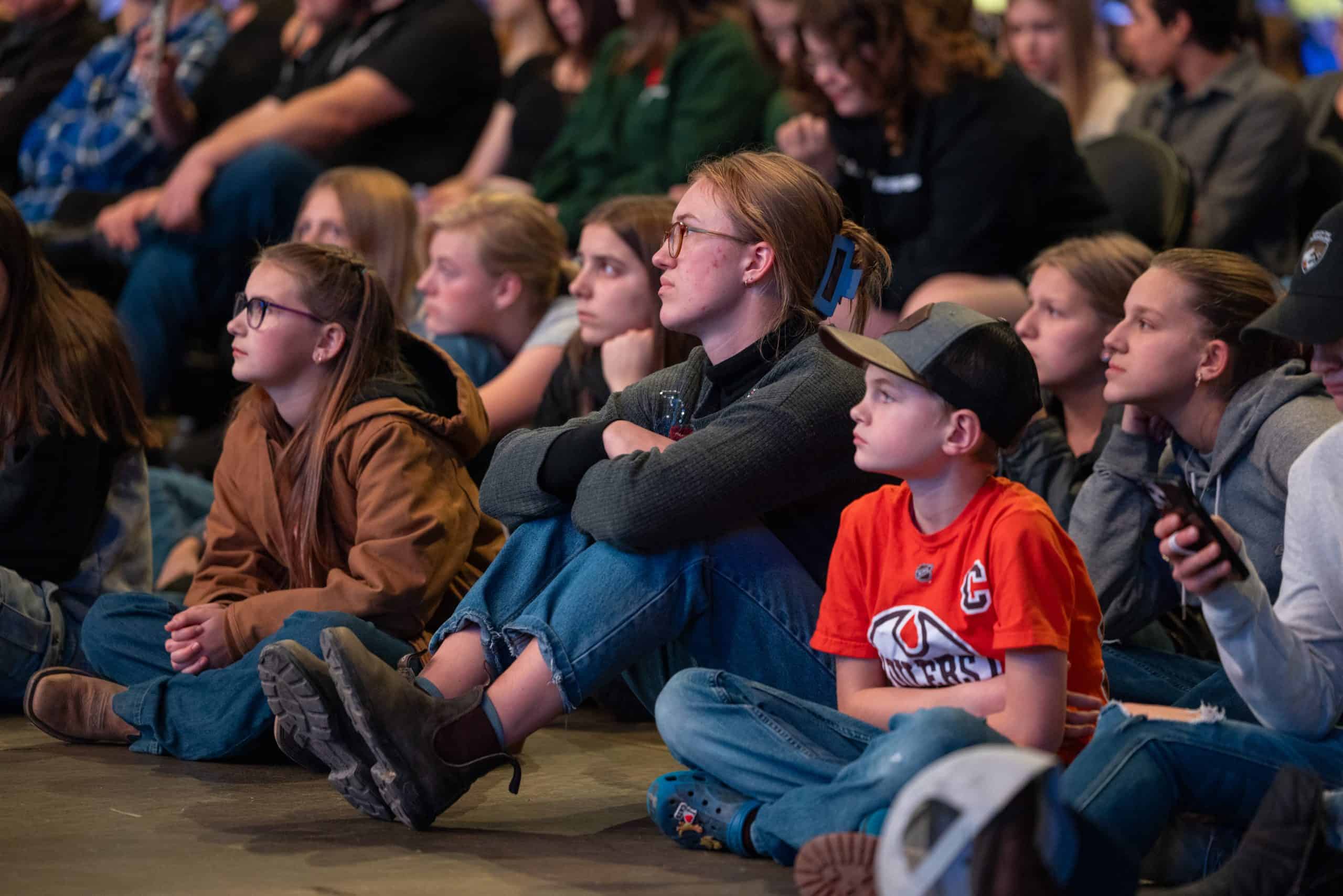 Young people listened intently as Will spoke: “Jesus Christ is alive today, and He wants to come into your life and change your life if you’ll let Him.” 